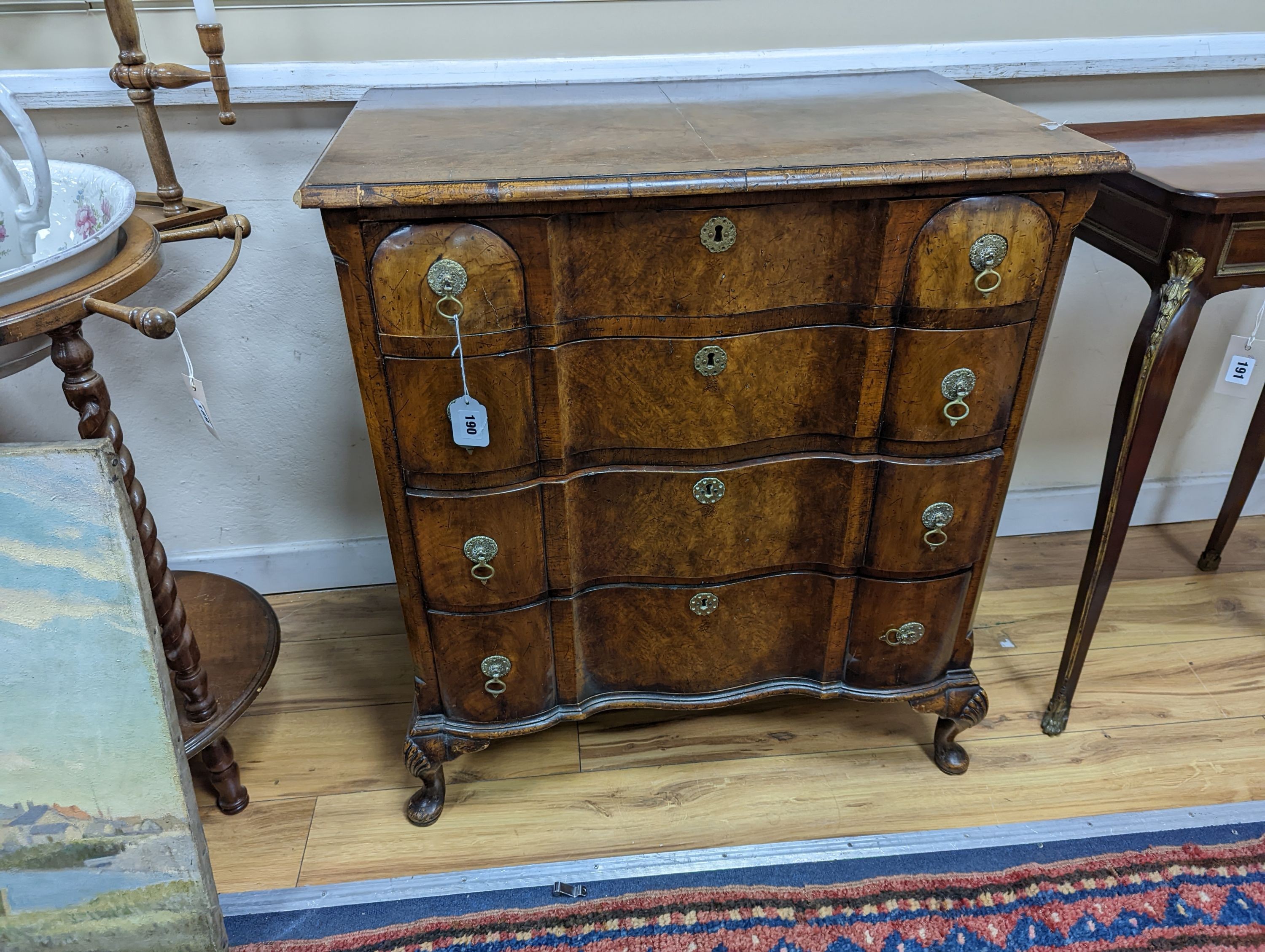 An early 20th century Queen Anne revival banded walnut shaped front chest, width 77cm, depth 46cm, height 85cm